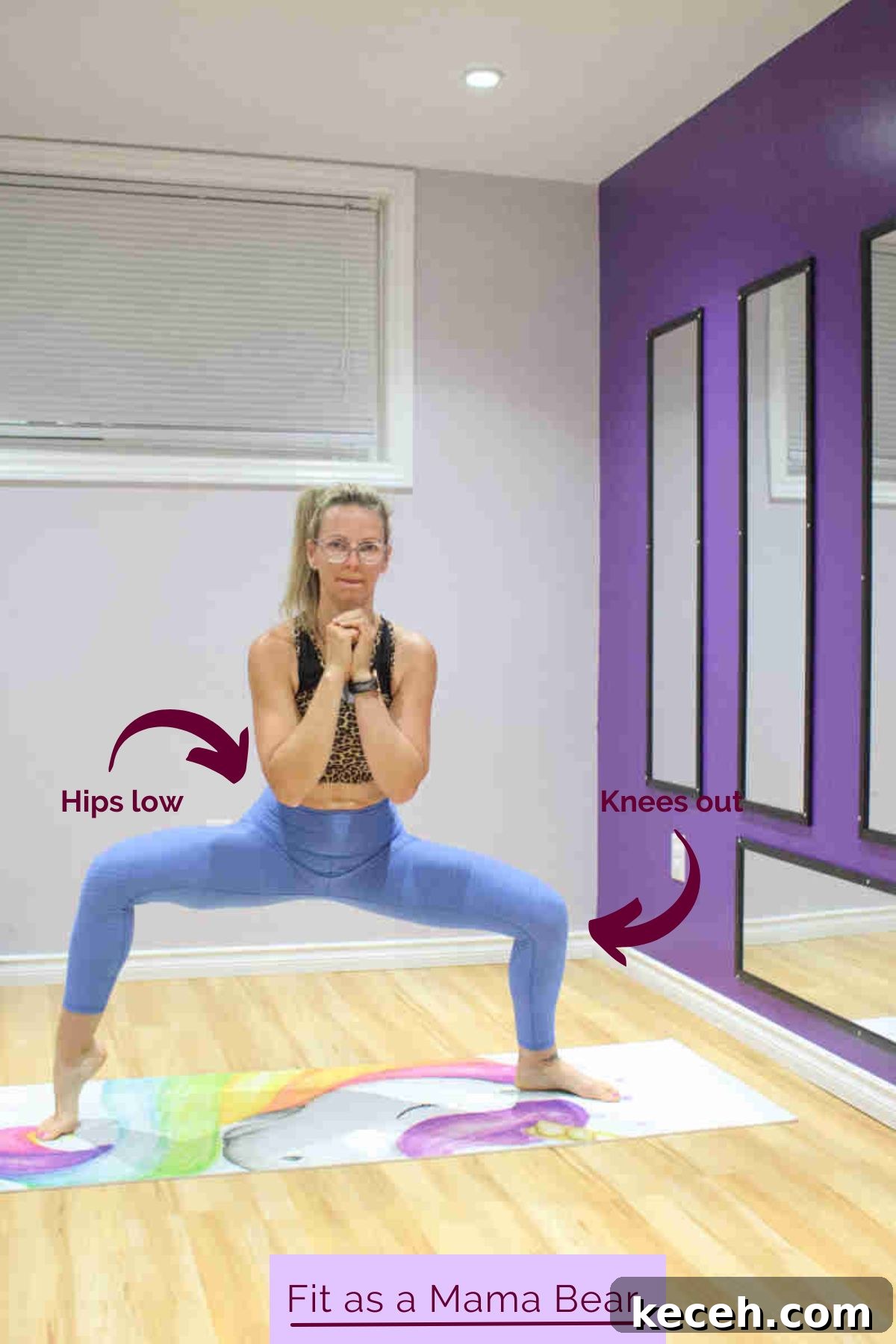 4-Minute Daily Workout Challenge — Day 4 Routine 2 A woman in blue pants and sports bra performing a squat with one calf raised.