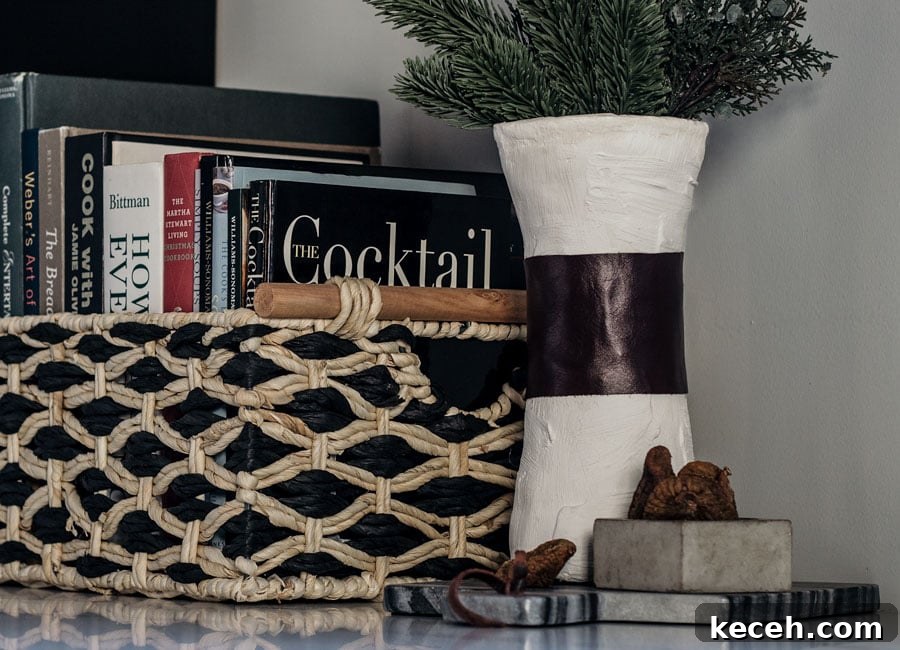 Learn to create this faux pottery vessel from and old glass vase and a little bit of plaster!