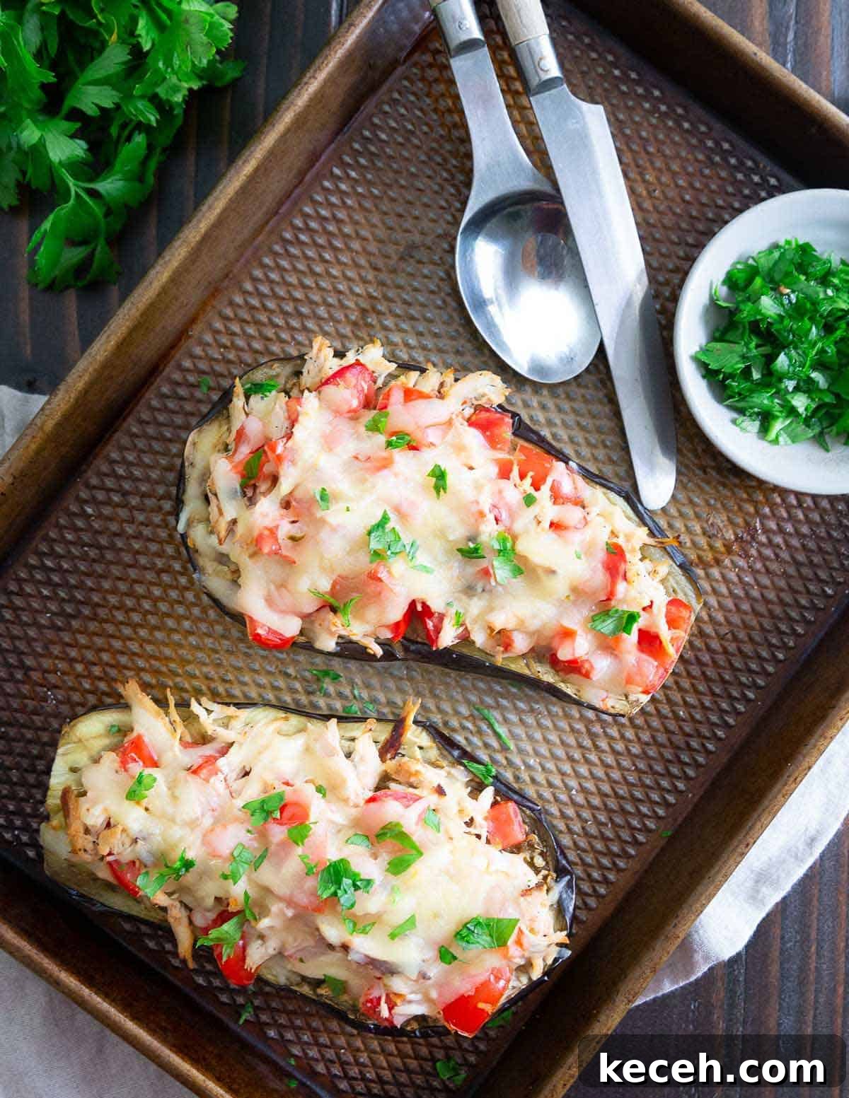 Eggplant stuffed with shredded chicken and cheese makes an easy, flavorful meal. Eggplant stuffed with shredded chicken and cheese makes an easy, flavorful meal.