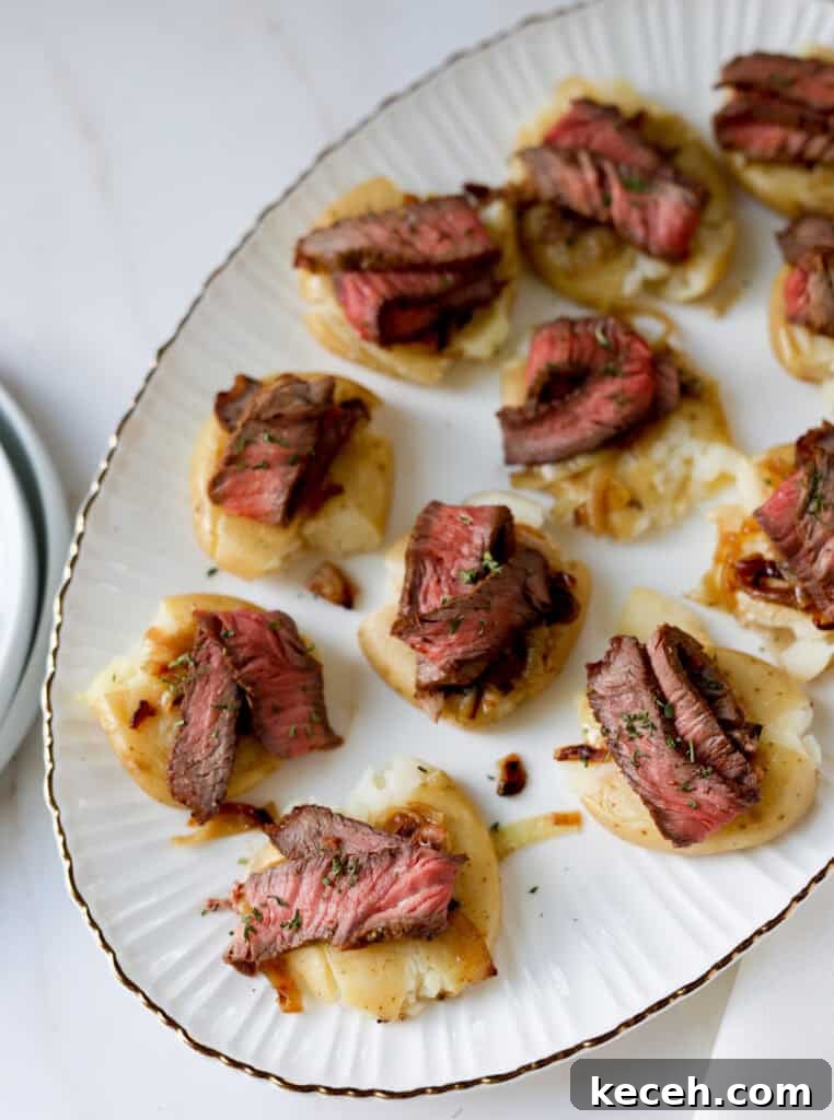 London Broil Smashed Potato & Caramelized Onion Crostini 2 London broil on smashed potato "crostini"
