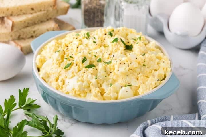 Fresh Summer Dinner Ideas: Light, Flavorful Recipes for Warm Nights 12 Classic Egg Salad served in a large blue bowl.