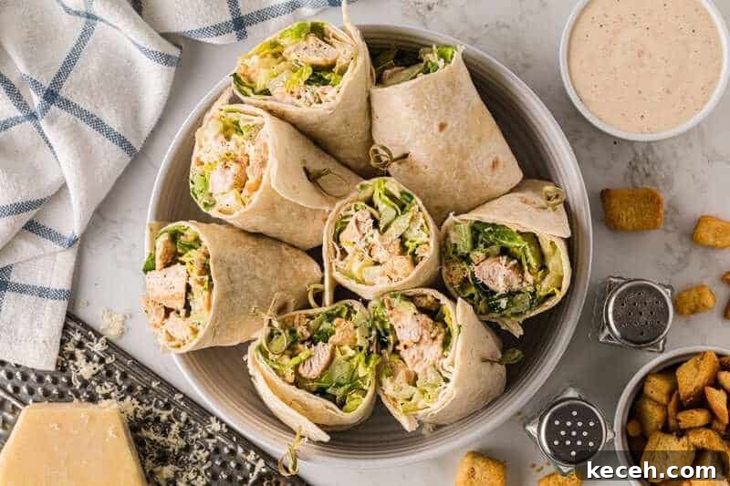 Fresh Summer Dinner Ideas: Light, Flavorful Recipes for Warm Nights 15 Chicken Caesar Wraps served open faced in a glass bowl.