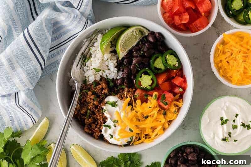 Fresh Summer Dinner Ideas: Light, Flavorful Recipes for Warm Nights 22 top-down view of the Taco Bowls served in a white bowl.