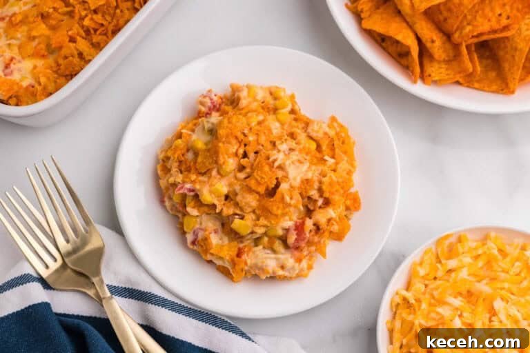 Fresh Summer Dinner Ideas: Light, Flavorful Recipes for Warm Nights 25 Dorito Chicken Casserole served on a white plate.