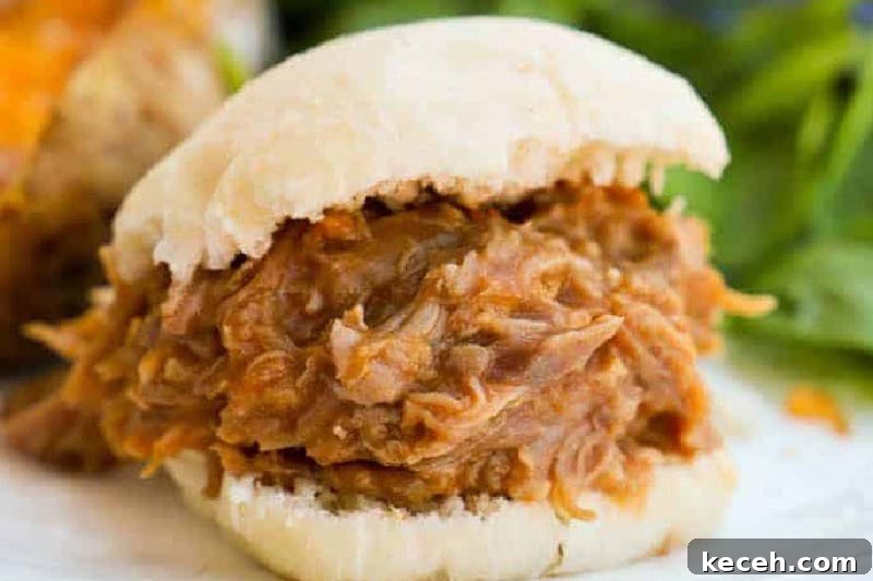 Fresh Summer Dinner Ideas: Light, Flavorful Recipes for Warm Nights 4 closeup of the Slow Cooker Pulled Pork Sliders.