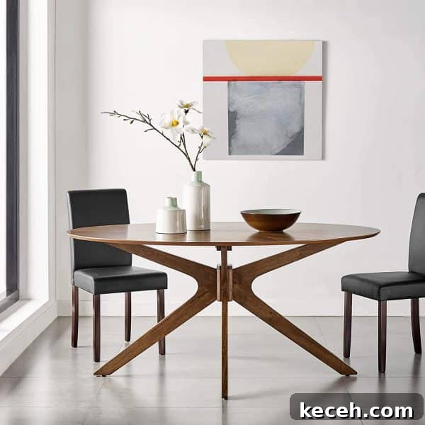 31 Mid-Century Dining Room Ideas to Redefine Your Space 31 Get an Oval Dining Table mid century modern dining room