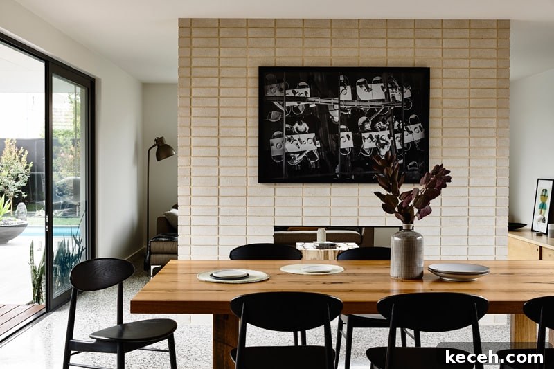 31 Mid-Century Dining Room Ideas to Redefine Your Space 9 Add Art to Your Wall mid century modern dining room