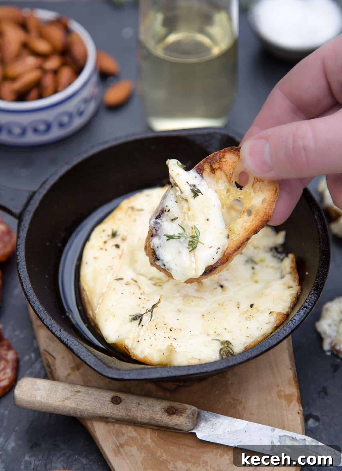 Grilled Baked Brie with Wine-Infused Glaze 7 A piece of toast with melted cheese