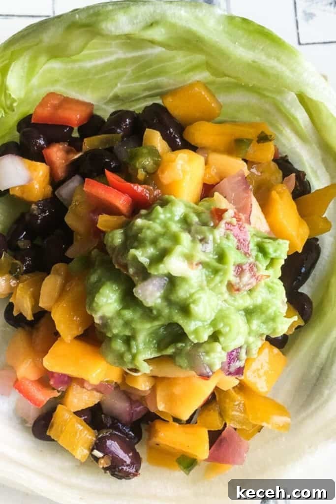 Black Bean Tacos with Fresh Homemade Guacamole Recipe 2 black bean taco wraps in lettuce