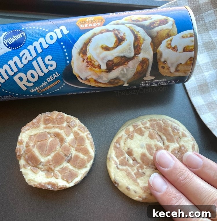 Step by step instructions on how to make yummy breakfast pigs in a blanket with a tube of Pillsbury Cinnamon Rolls and sausage. 