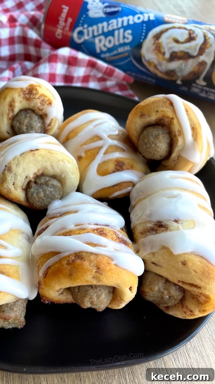 Sausage stuffed cinnamon rolls are a fun way to make pigs in a blanket for breakfast! Delicious handheld food your family is going to love. 