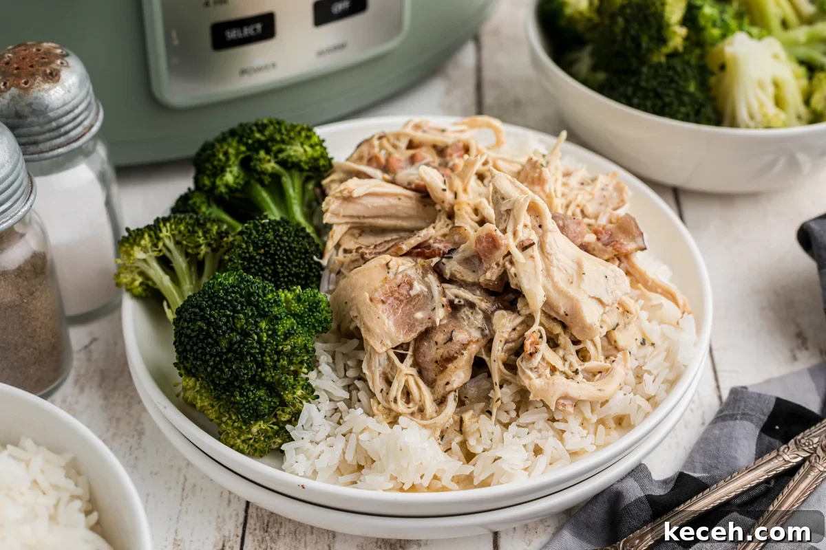 Slow Cooker Chicken in Bacon Gravy — Comforting One-Pot Meal 7 chicken and gravy with bacon on top of rice.